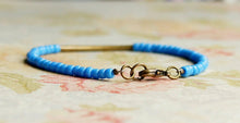 Load image into Gallery viewer, 7" Cornflower Blue Seed Beads And Bronze Bar Bracelet