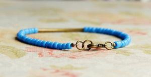 7" Cornflower Blue Seed Beads And Bronze Bar Bracelet