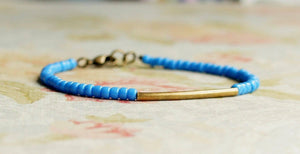 7" Cornflower Blue Seed Beads And Bronze Bar Bracelet